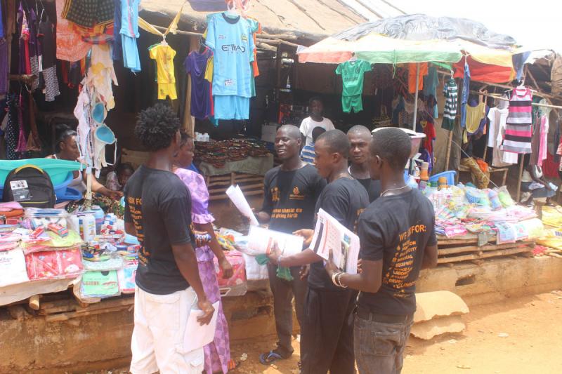 Young activists provide safe clinic messages to market women in Bonthe